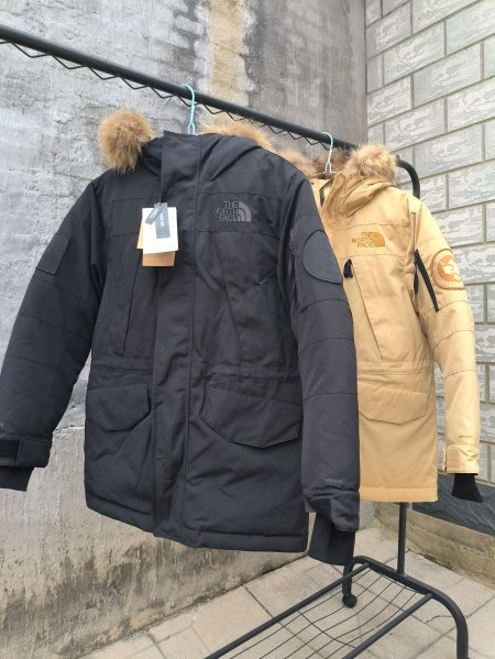 The North Face Arctic Series: Thickened raccoon fur collar, 90% white duck down fill. Colors: Black, Yellow. Sizes: S-2XL.