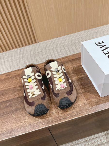 Loewe Ballet Runner 2.0 sneakers feature a redesigned toe and heel for superior comfort. Made from imported suede, calfskin, and trench fabric with a custom mold sole. Simple, versatile, and stylish. Sizes 35-45.
