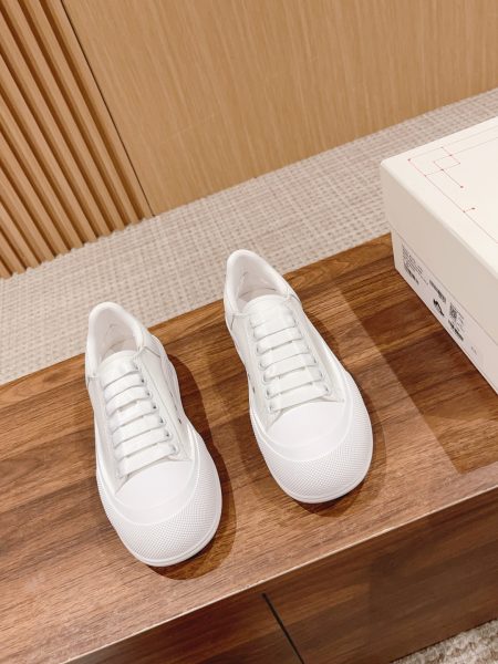 Premium Alexander McQueen canvas sneakers with oversized rubber sole. Signature detail, suede heel. Unisex sizes 35-44 available.